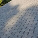 Roofing shingles on a residential roof in Wexford, PA, showcasing texture and pattern, relevant to home maintenance and exterior improvement.