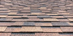 Shingle roof texture showcasing replacement materials for Spanish-style homes in Pittsburgh, Pennsylvania.