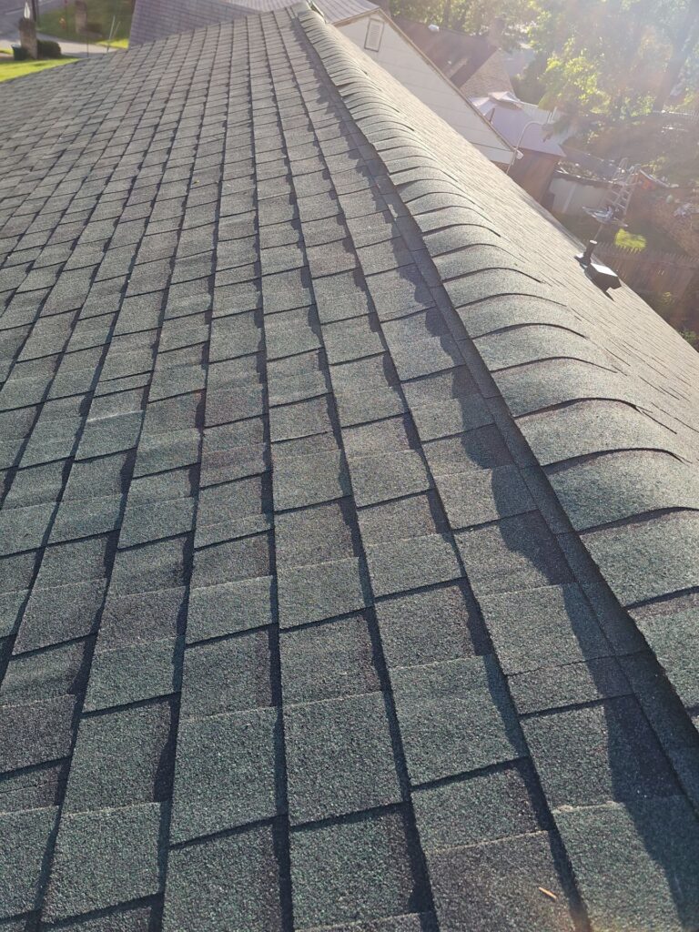 Roofing shingles on a sloped roof, showcasing quality materials used in Pittsburgh home construction and maintenance.