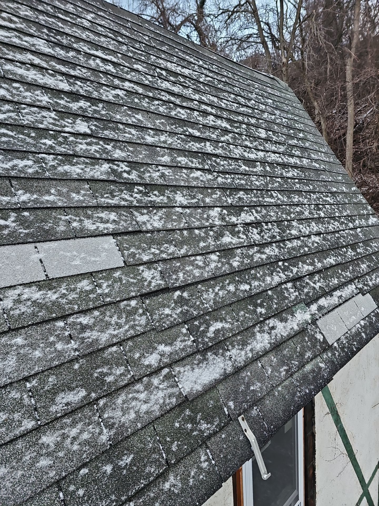 Old worn shingles covered in lichen and moss in Pittsburgh, Alan Construction