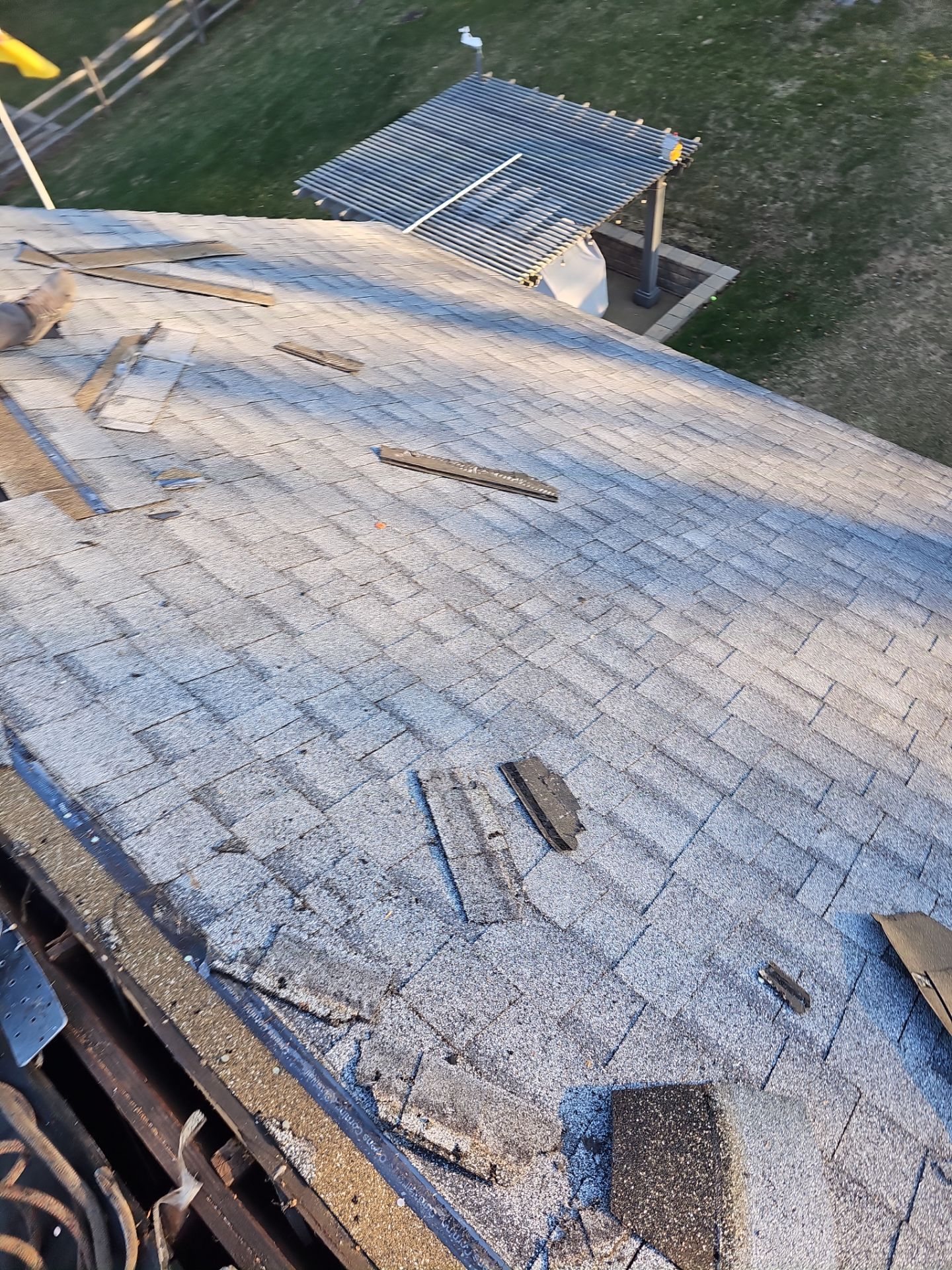 Old weathered shingle roof with debris and broken tabs in Pittsburgh, Alan Construction