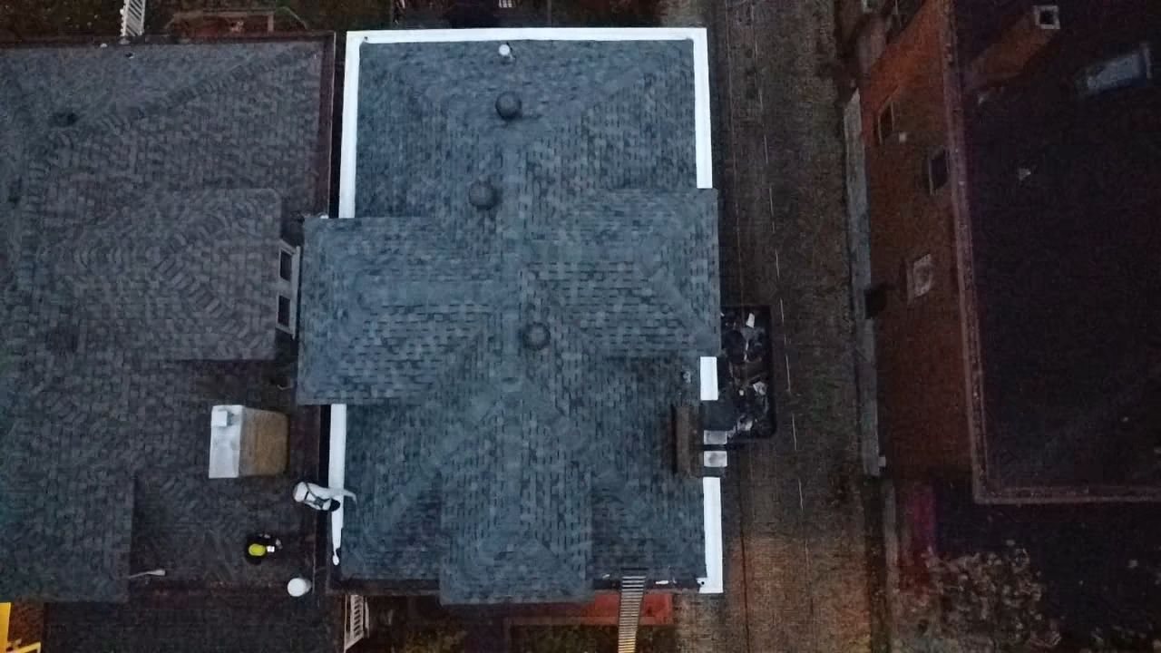 Top down drone view of a finished gray hip roof in Pittsburgh, Alan Construction
