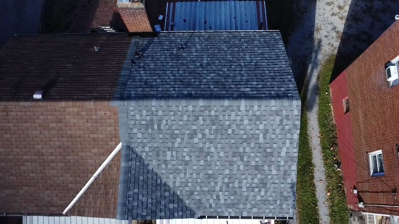 Top down drone view of a new gray shingle roof in Pittsburgh, Alan Construction