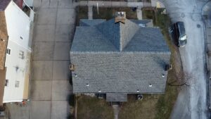 Top down drone view of a finished gray shingle roof in Pittsburgh, Alan Construction
