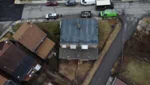Drone view of a house with a finished gray roof in Pittsburgh, Alan Construction