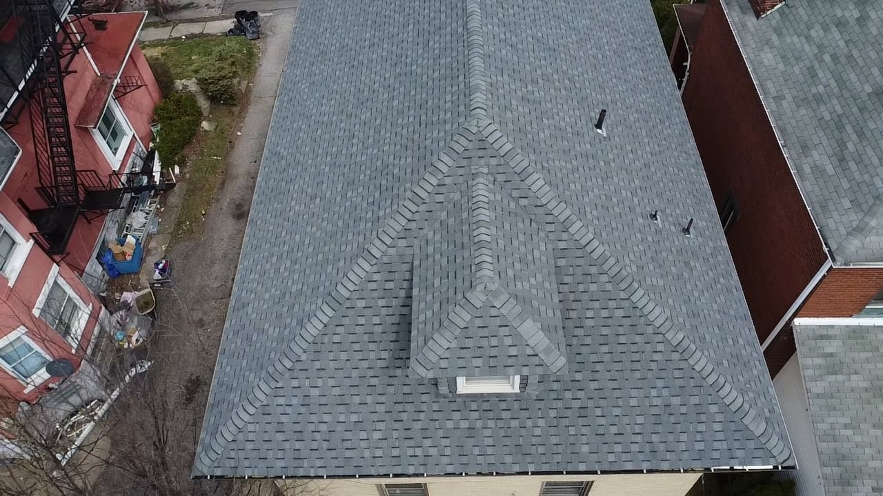 Drone shot of a completed gray hip roof with dormer in Pittsburgh, Alan Construction