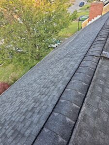 Shingled ridge cap running along a new roof in Pittsburgh, Alan Construction