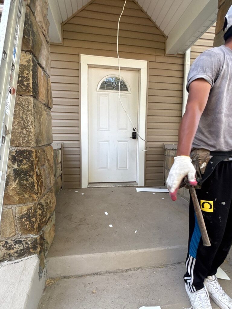 New siding and trim around the front door