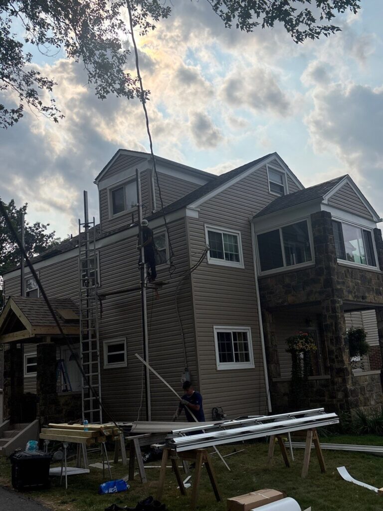 New tan vinyl siding going up in Scott Township