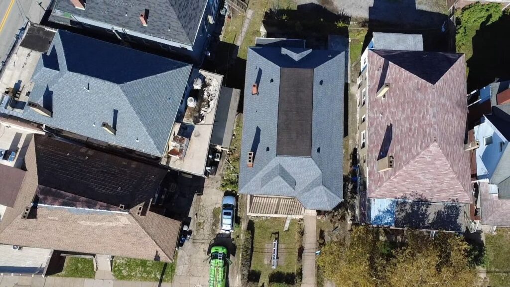 New gray shingle roof finished