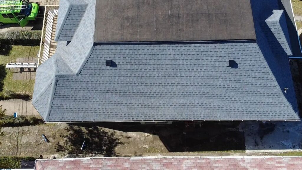 New gray architectural shingle roof