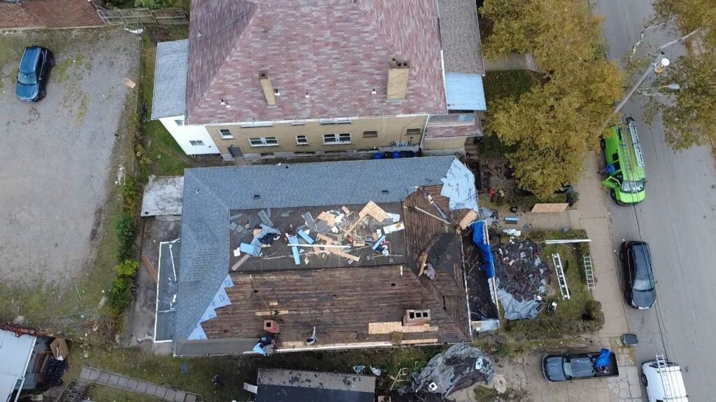 Old shingles coming off a Squirrel Hill roof