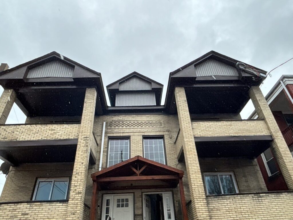 New siding and trim on the front of a Beechview home