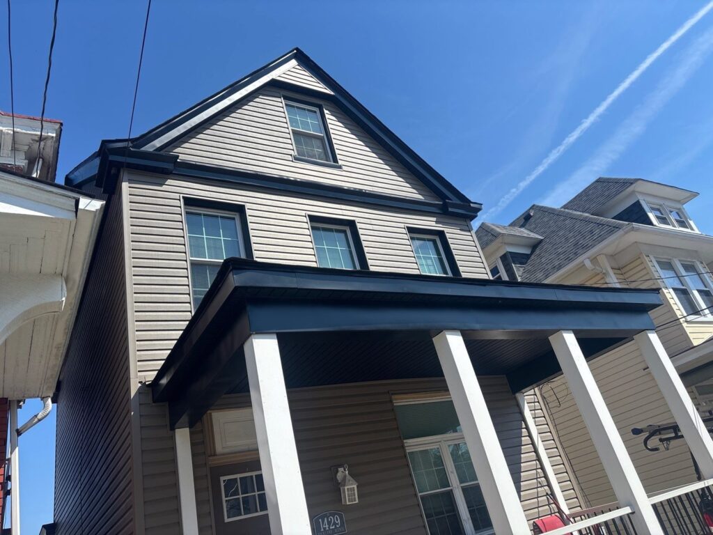 New siding and porch trim on a Beechview home