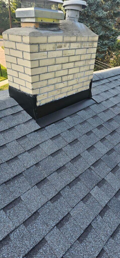 Chimney flashing detail on a new Bethel Park roof