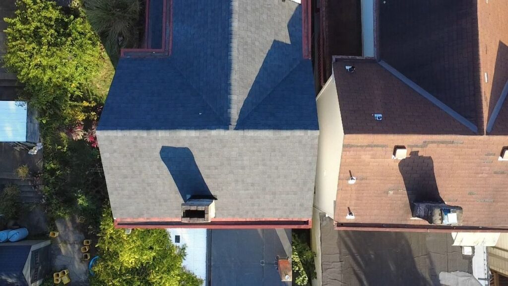 Aerial of a new roof beside neighboring Bethel Park homes