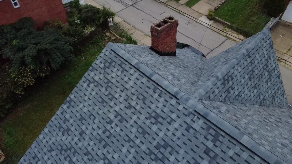 New shingles and ridge around the chimney on a Carrick roof