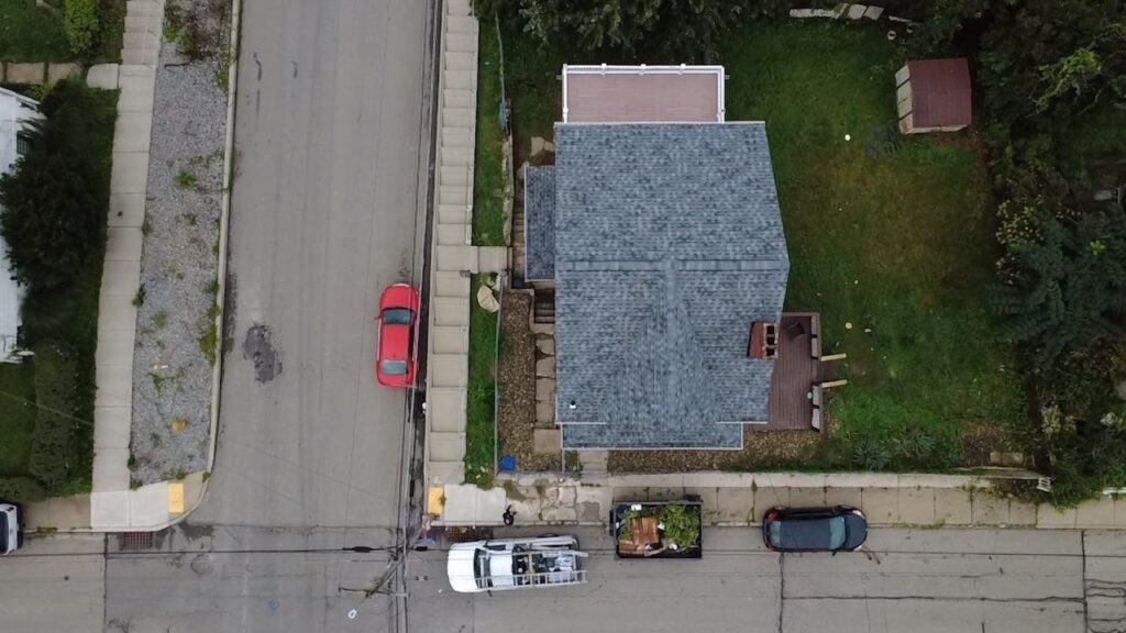 Finished Carrick roof replacement seen from above the street