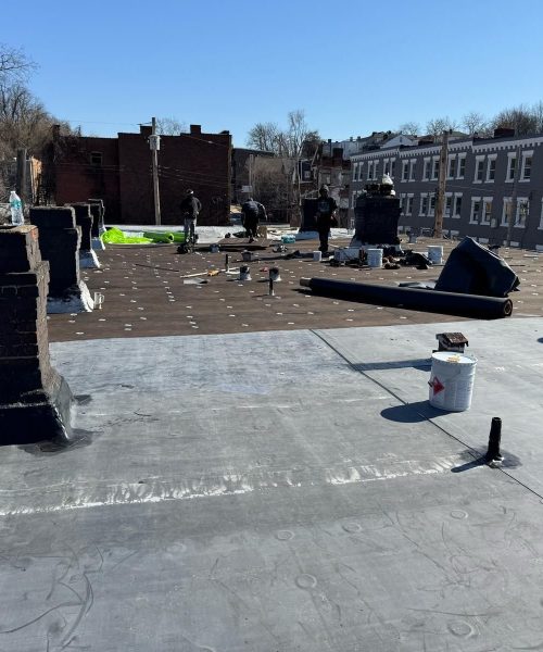 New flat rubber roof with chimneys and vent pipes in Pittsburgh, Alan Construction