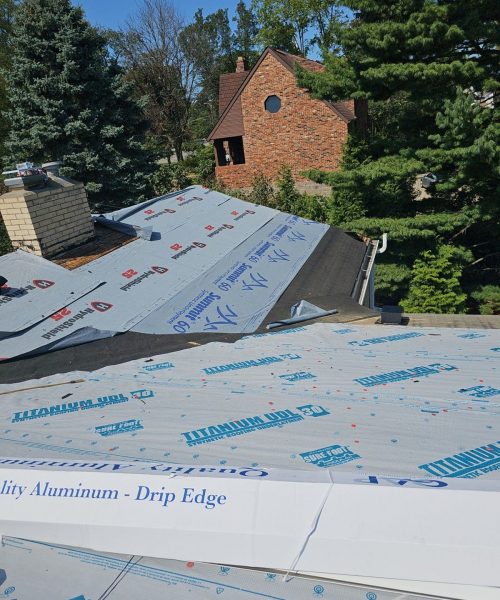 New drip edge and underlayment at the edge of a Bethel Park roof