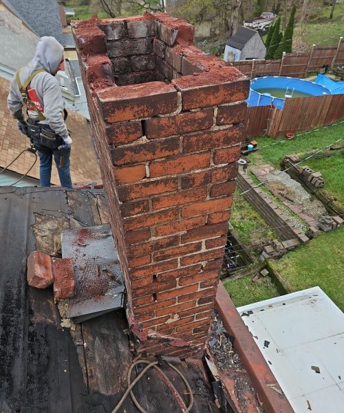 Worn chimney brick found during a Carrick tear off