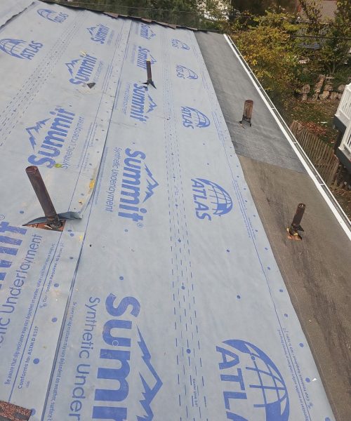 Underlayment sealed around the vent pipes on a Mount Lebanon roof