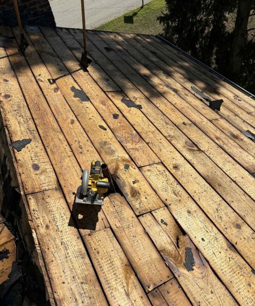 Board decking exposed during a South Hills tear off
