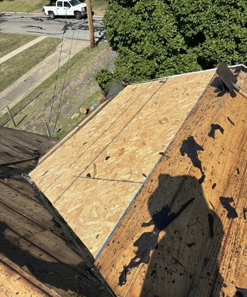 New decking patched into an old roof deck in the South Hills