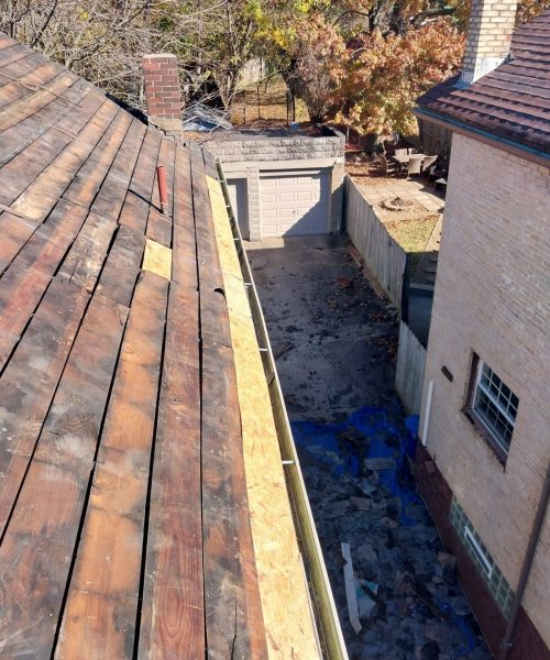 Original board decking exposed during a Squirrel Hill tear off