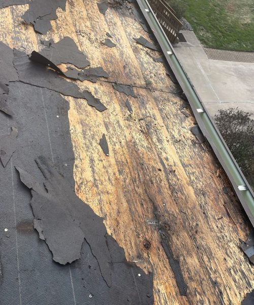 Old roof deck exposed after the tear off on a Whitehall home